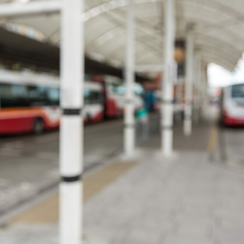 Blur view of parked buses at bus station